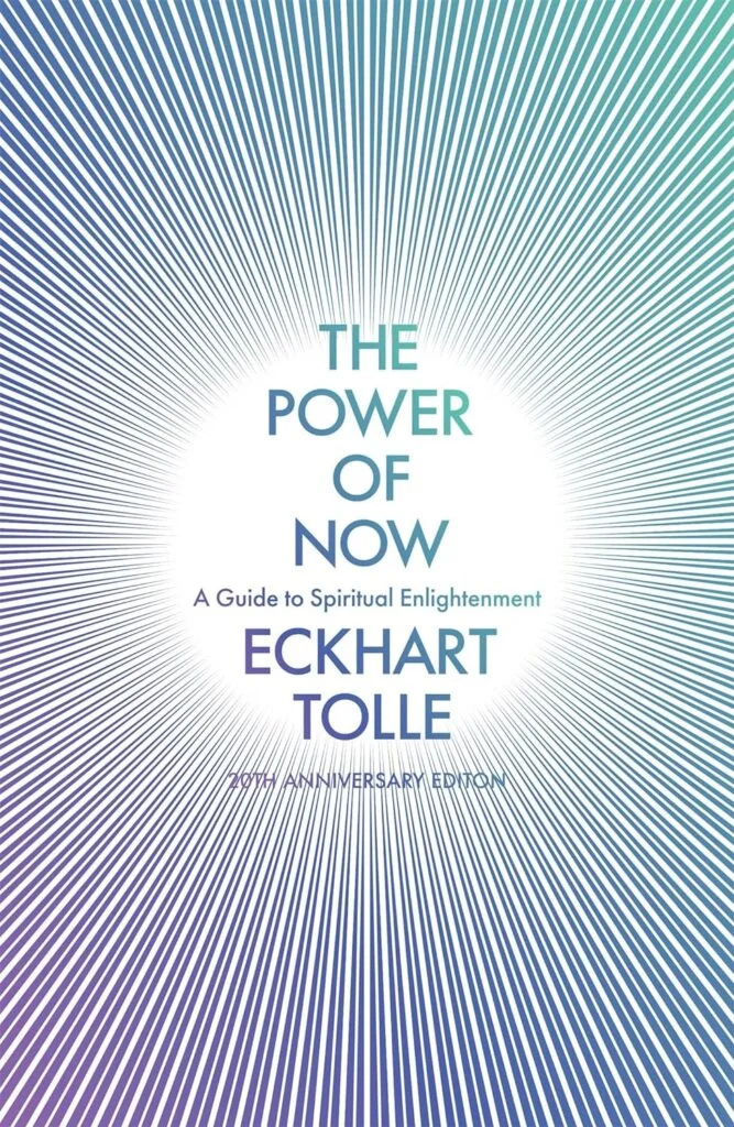 Colourful Front page of the book by author Eckhart Tolle "The Power of Now"